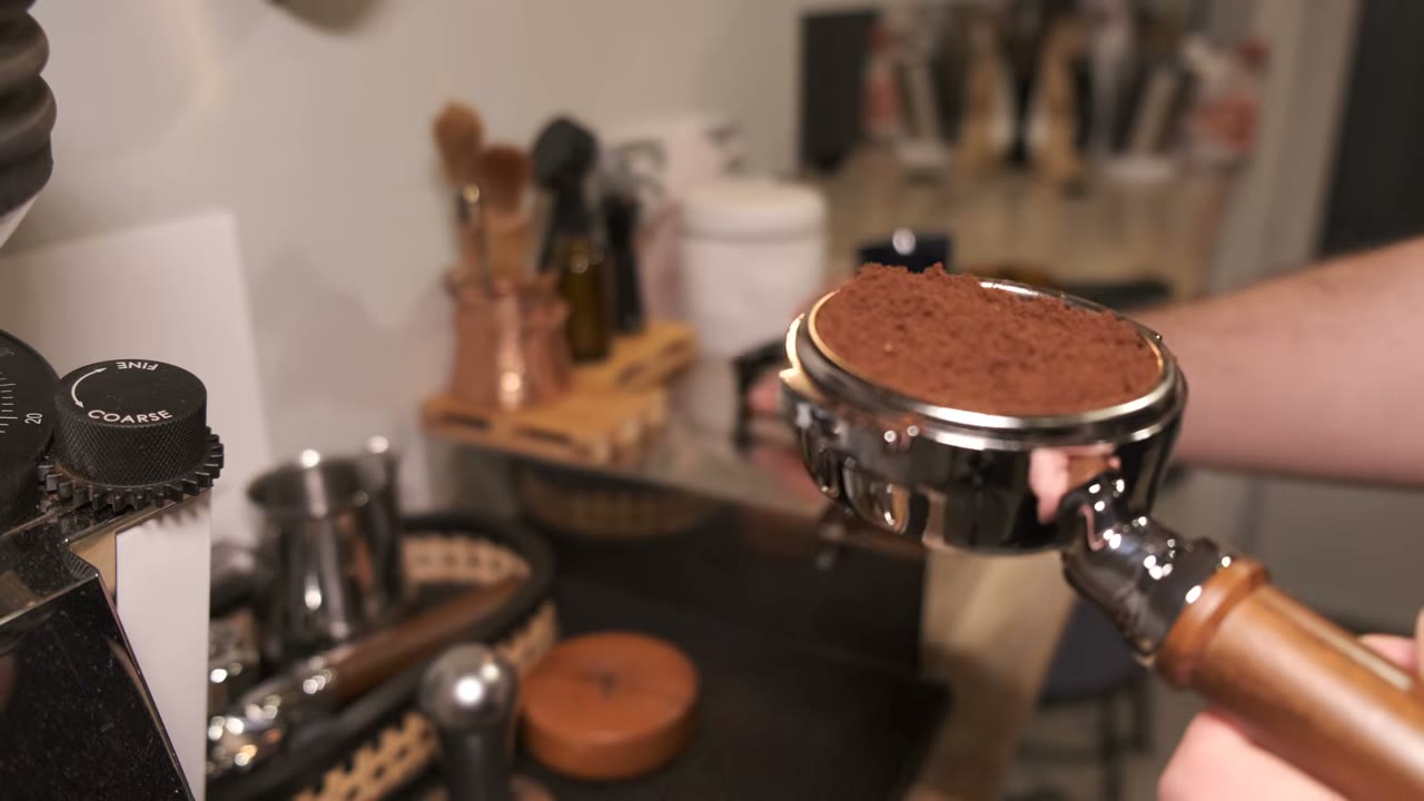 Loose coffee in the basket after removing the dosing funnel